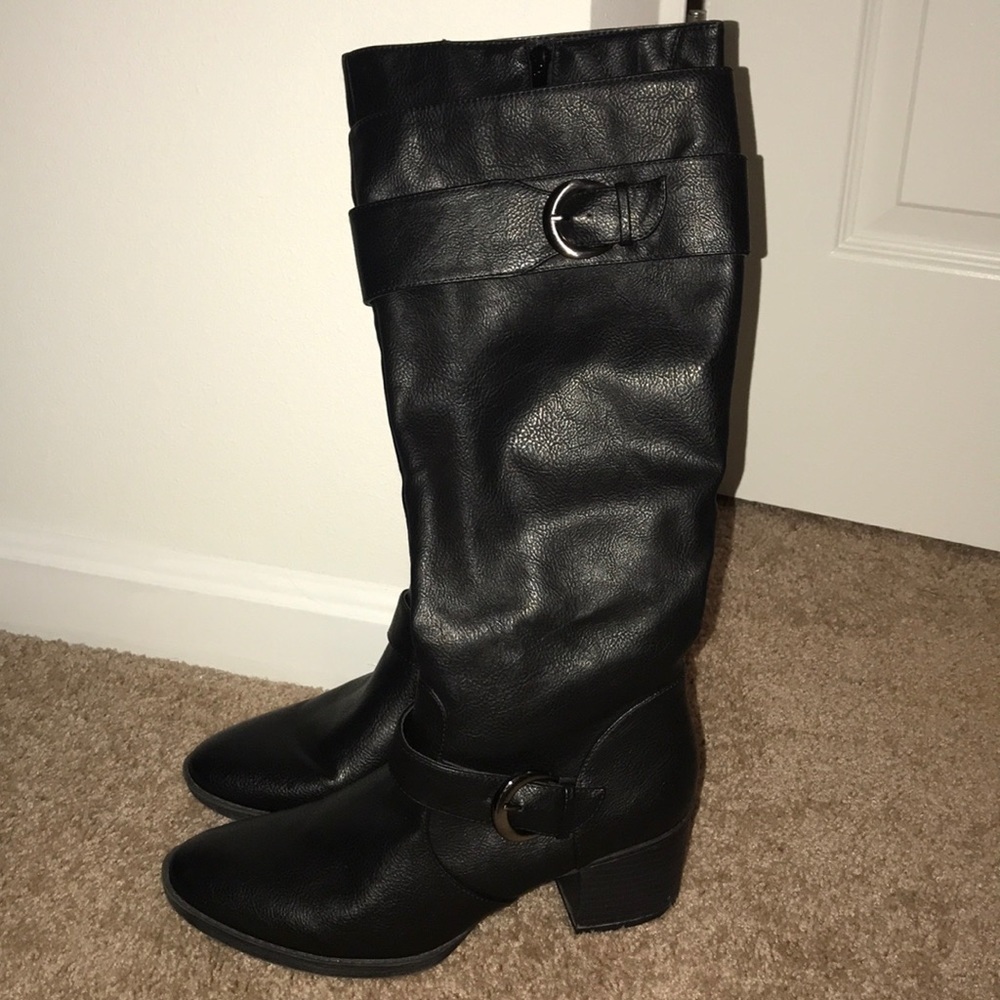 Black boots with buckets.